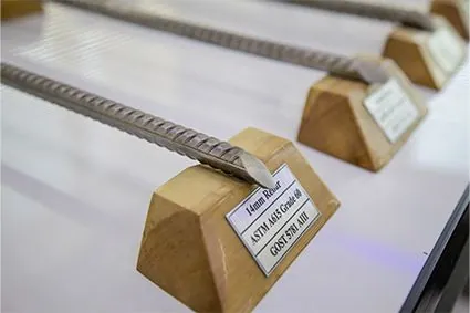 Maihan 14 mm rebar sample on display, labelled ASTM A615 Grade 60